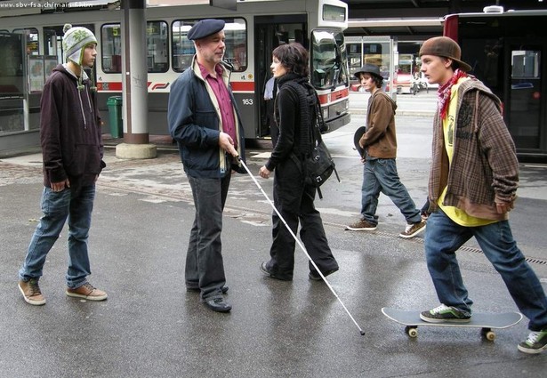 Walking using a white cane